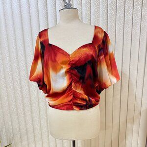 Cropped Blouse. Red/Blalck/Cream Print Short Puff Sleeves with Elastic Back. NWT